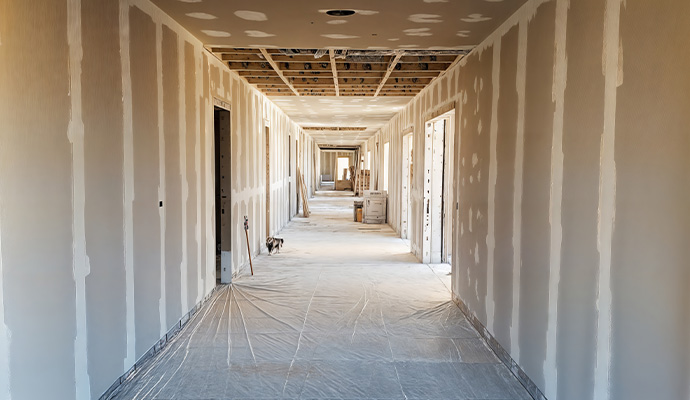 Commercial building interior hallway undergoing reconstruction