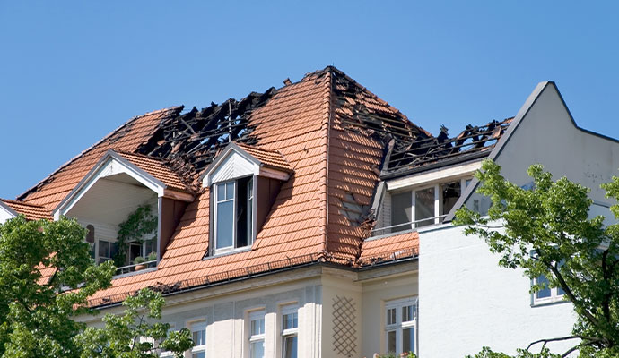 Fire damaged residential house roof