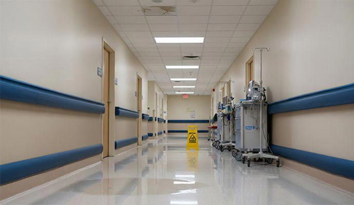 Clean hospital corridor after water damage restoration service