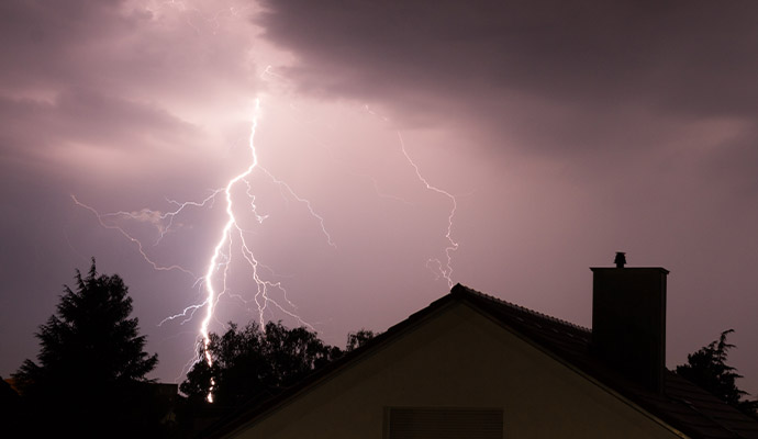 Lightning bolt striking on the night sky