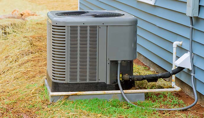 Outdoor HVAC unit with discharge lines